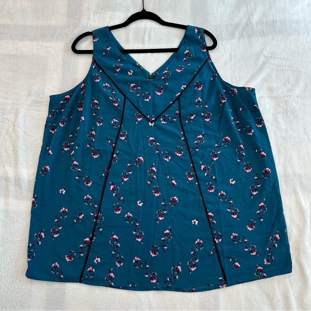 Lane Bryant teal floral sleeveless v neck blouse with black trim, size 16
